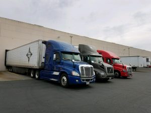 red, black and blue truck